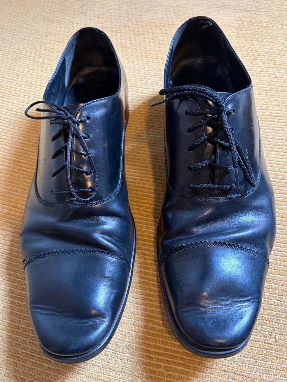 Salvatore Ferragamo black leather cap-toe oxford